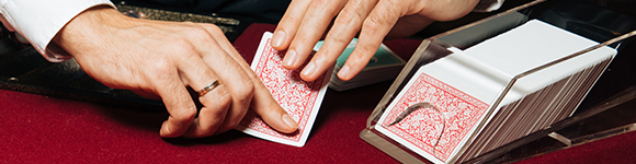 Dealer dealing blackjack cards