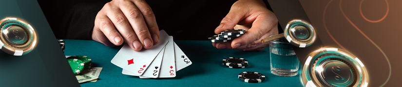 a poker player holding cards and poker chips